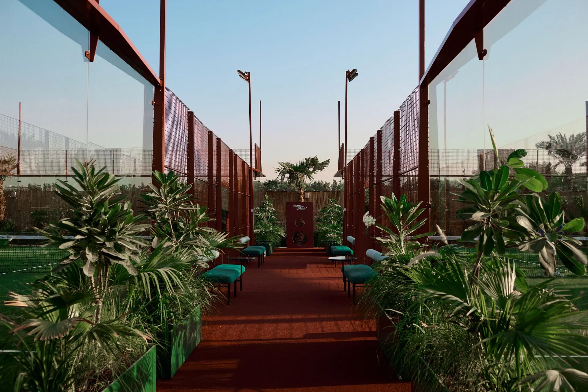 Walkway with green sofas